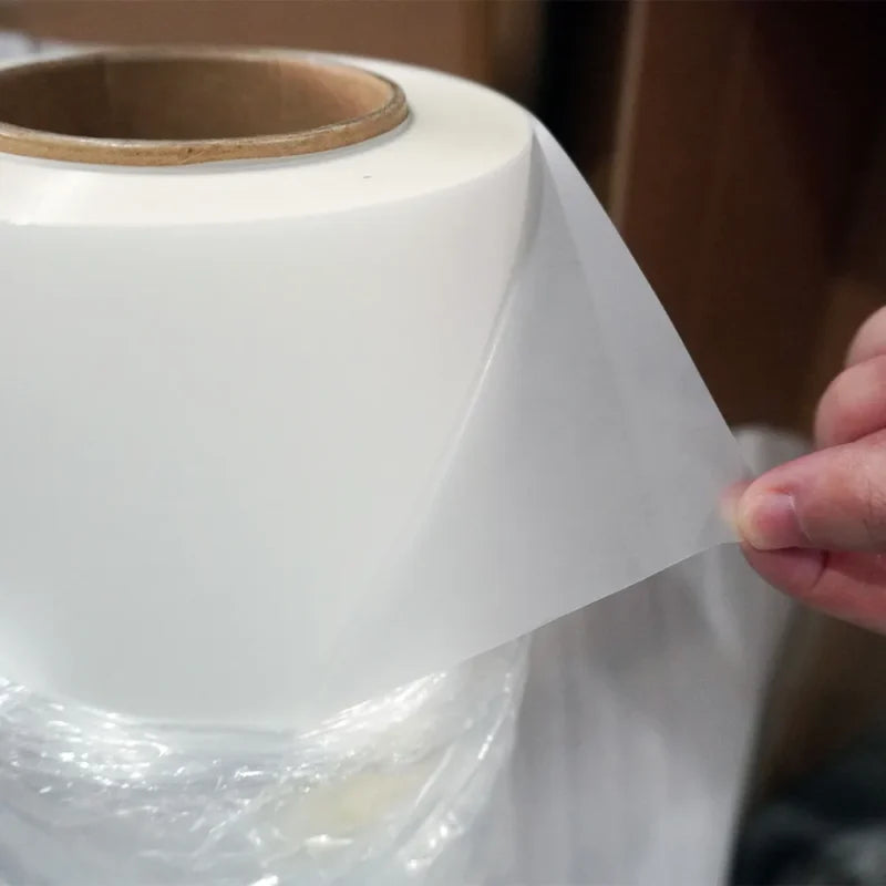 Clear PET DTF hot peel film being unrolled
